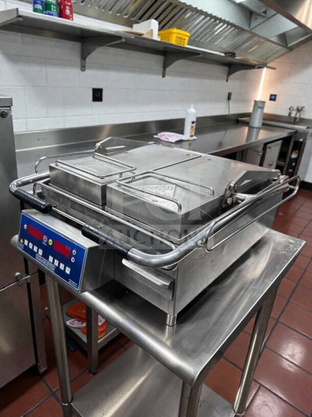 Immaculate DoughPro double-sided commercial contact grill with programmable digital controls, 115V, NSF & UL listed.