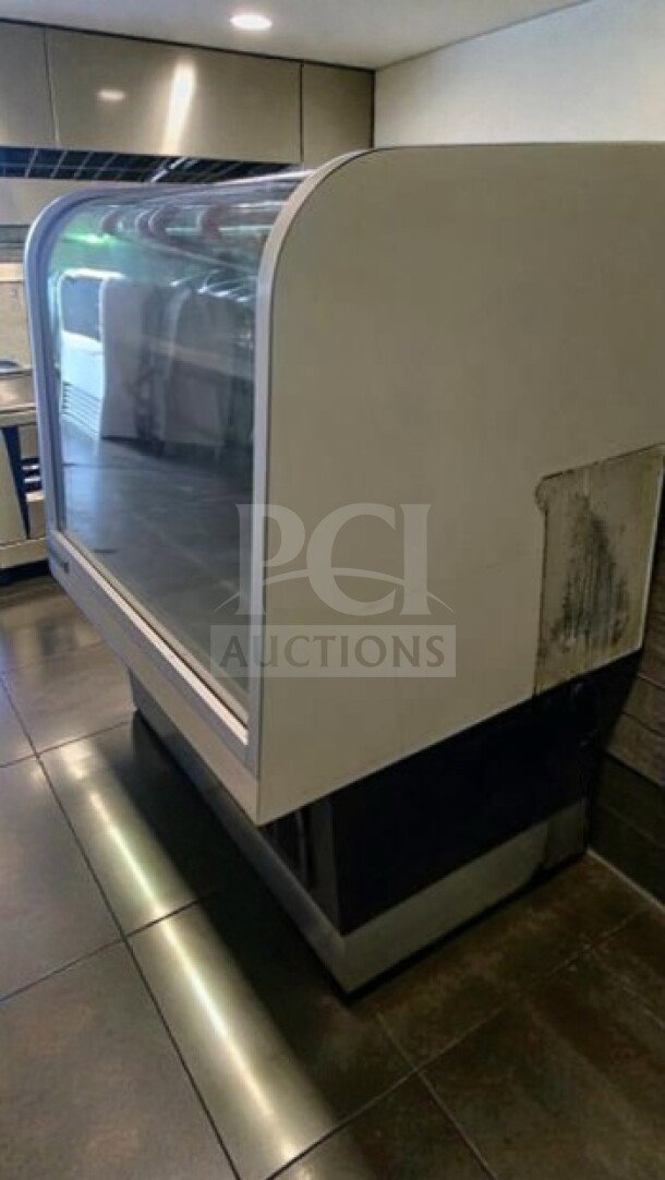Impeccable C. Schmidt EHD-4 refrigerated deli display case with curved glass, 115V, fully tested and operational.