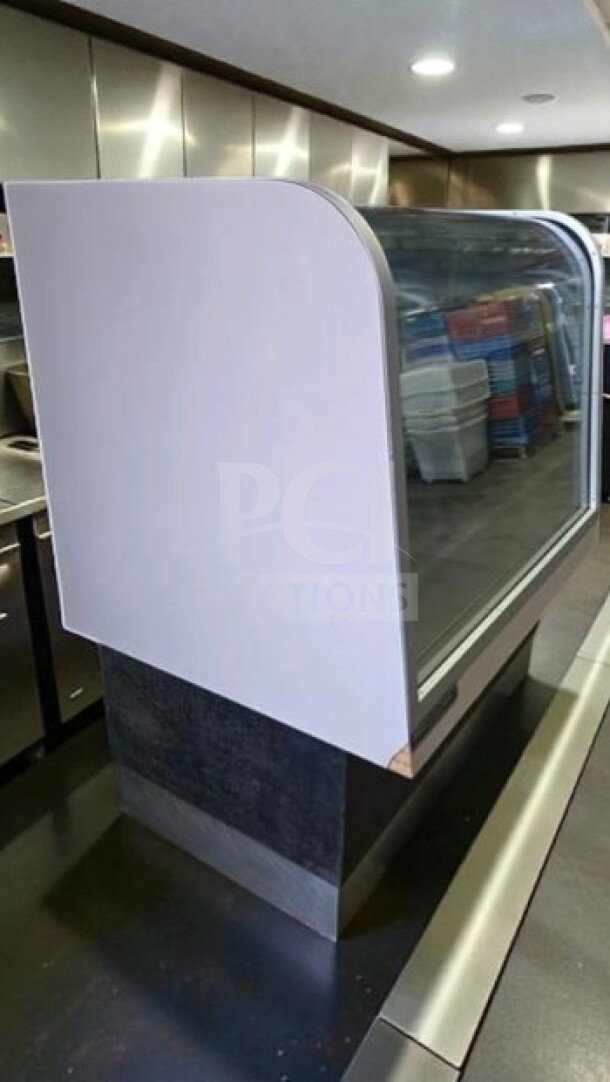 Impeccable C. Schmidt EHD-4 refrigerated deli display case with curved glass, 115V, fully tested, operational, excellent condition.