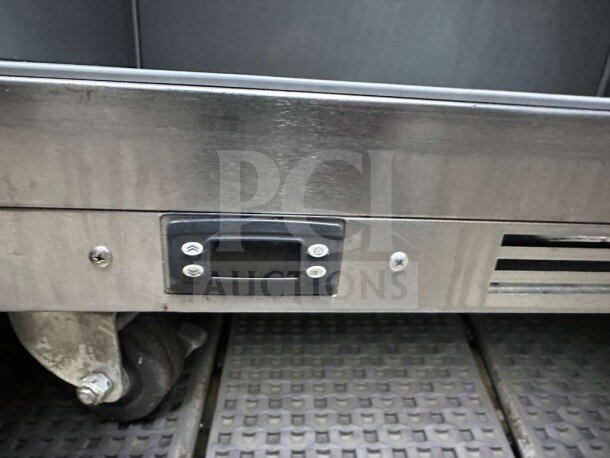 Beverage-Air stainless steel undercounter commercial refrigerator, UL Listed, digital controls shown, wheel detail visible.