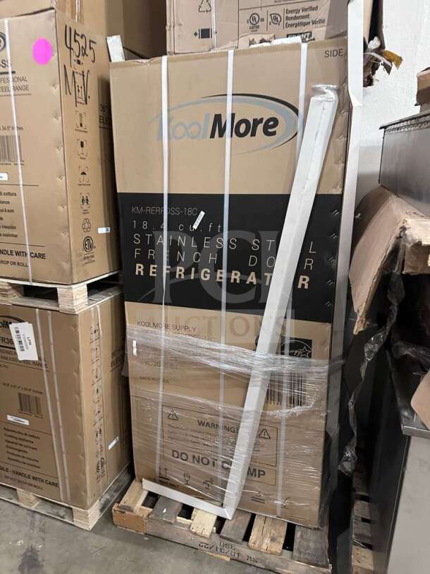 Brand new KoolMore KM-RERFDSS-18C 18.4 cu. ft. stainless steel French door refrigerator in box on pallet.