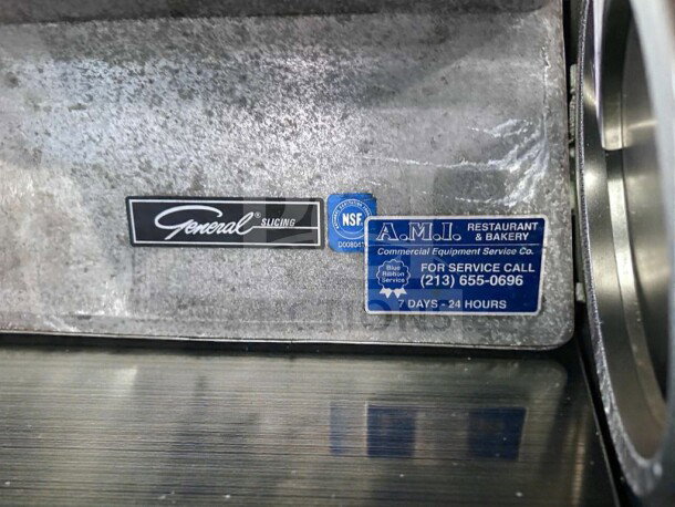NSF-certified General Slicing/Red Goat commercial vegetable slicer with visible service label, model GEN-M-SLC-0546.