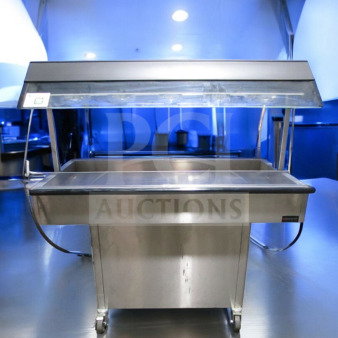 Duke E304 4-well commercial electric steam table in very good condition with sneeze guard, tested and operational, 208V.