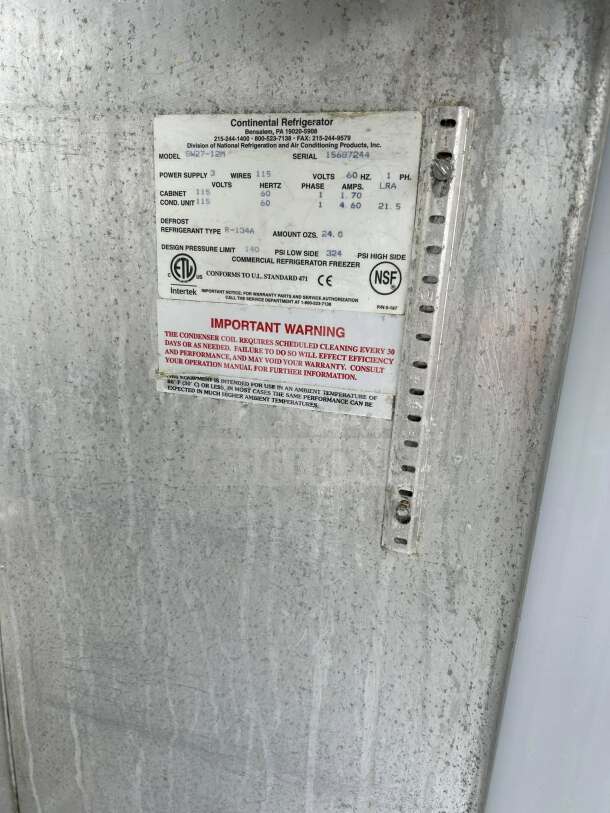 alt text: Continental SW27-12M label on stainless steel. Features specs, certifications by UL and NSF, and maintenance warnings.