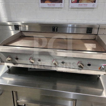 Commercial gas countertop griddle by Cooking Performance Group, model CPG-L-GRD-0405. Stainless steel, natural gas, fully tested, excellent condition.