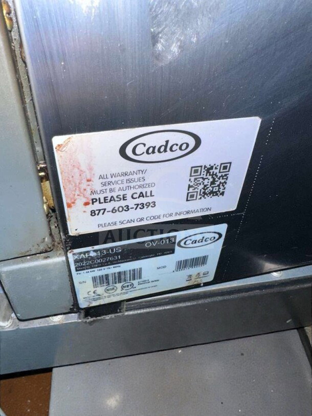 Cadco OV-013 XAF-013-US Convection Oven, NSF & UL listed. Visible labels include model, serial number, and contact info.