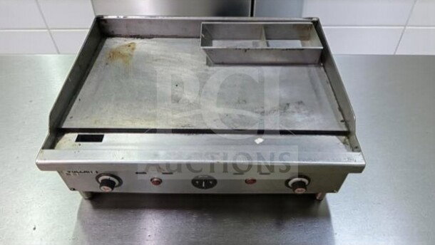 Vulcan Commercial Gas Griddle, Model VUL-L-GRD-0548, heavy-duty flat top, fully operational, some surface wear visible.