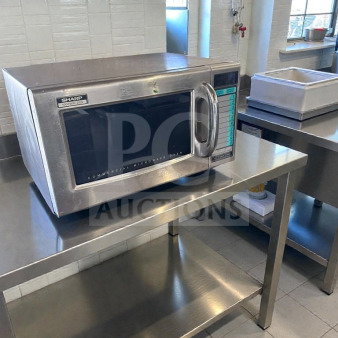 Sharp R-21LV commercial microwave oven, 1000W, stainless steel, in premium condition, fully tested, on a stainless steel countertop.