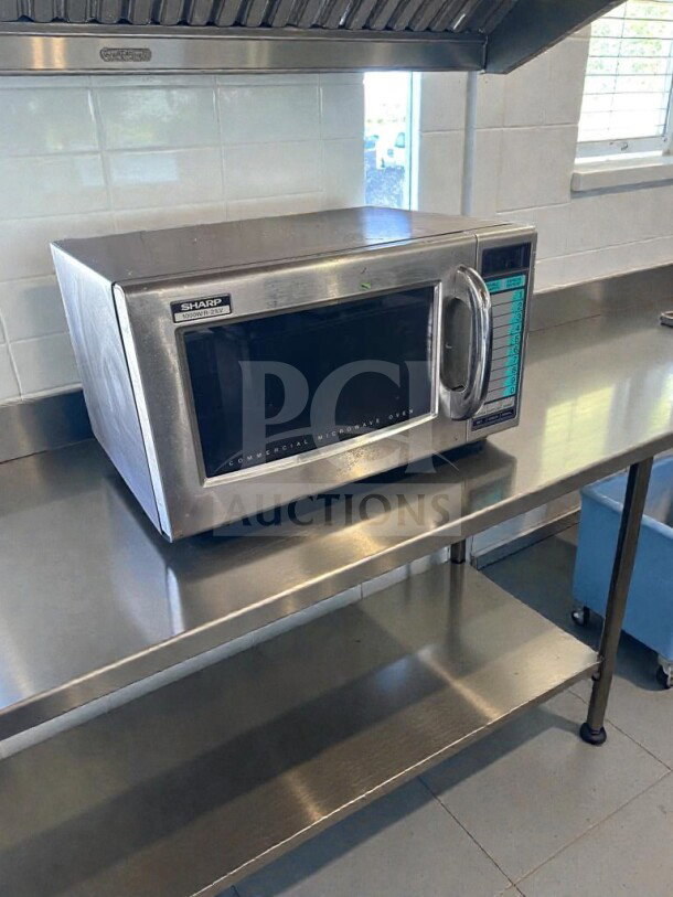 Sharp R-21LV commercial microwave, 1000W, stainless steel, premium condition, fully tested, on stainless steel counter.