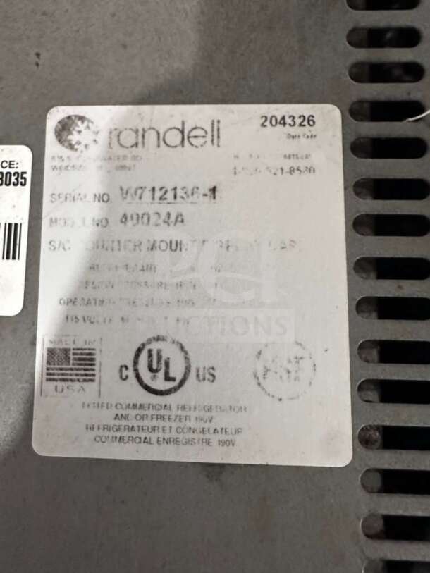 Label close-up of Randell 4002A commercial undercounter glass door refrigerator. Serial No. V0712136-1, UL listed, made in USA.