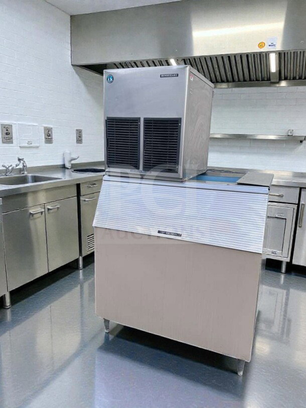 Hoshizaki E-1001MAH modular ice maker with storage bin, air-cooled, UL & NSF listed. Excellent condition, fully tested.