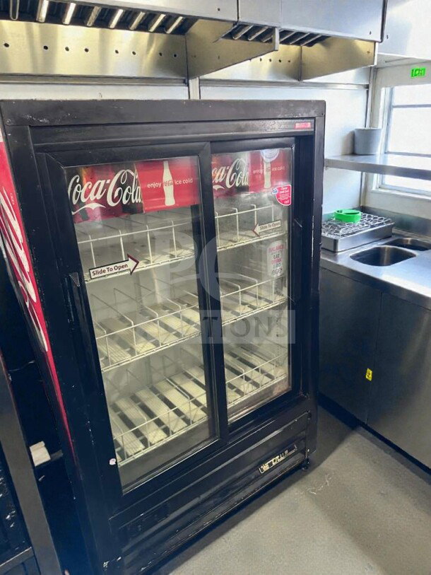 True GDM-33SL-54EM-LD Coca-Cola glass door merchandiser fridge, 54", premium condition, UL listed, fully tested.