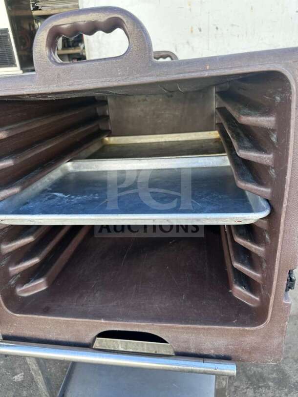 Carlisle Insulated Food Carrier, commercial model. Impeccable condition, fully tested. Features durable handle and interior shelves.