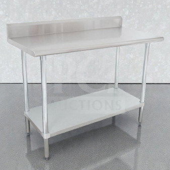 Brand new Advance Tabco KLAG-304-X stainless steel work table with backsplash. Scratch & dent condition. Model ADV-S-TBL-0052.