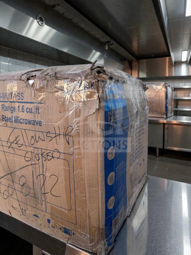 Brand new KoolMore KM-MOT-1SS microwave, 1.6 cu. ft., stainless steel, UL listed, in original box with visible handling wear.