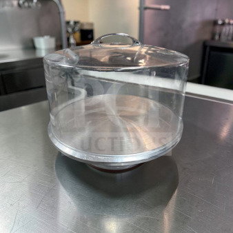 Acrylic cake display dome with stainless steel base, 12" diameter, premium condition, ideal for commercial bakery use.
