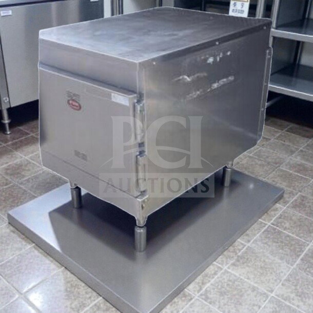 FWE HLC-1826-4(A) countertop heated holding cabinet. Stainless steel, 4 pan capacity, elite condition, 120V, tested.