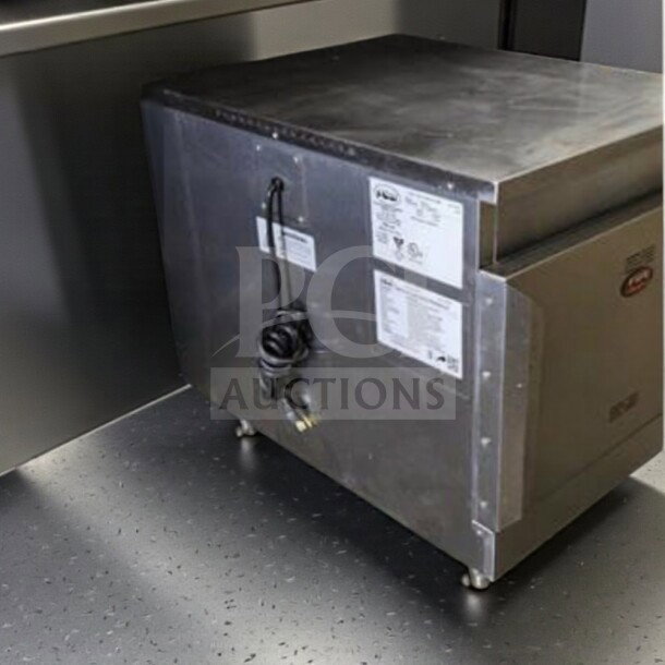 FWE HLC-1826-4(A) countertop heated cabinet, 4-pan capacity, elite condition, 120V, operational, visible power cord and labels.