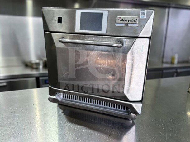 Merrychef eikon e4 high-speed oven in exceptional condition on a stainless steel counter, featuring digital controls.