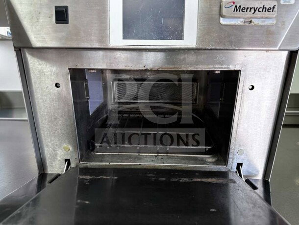 Merrychef eikon e4 oven, exceptional condition, 208/240V, fully tested and operational, visible label, stainless steel finish.