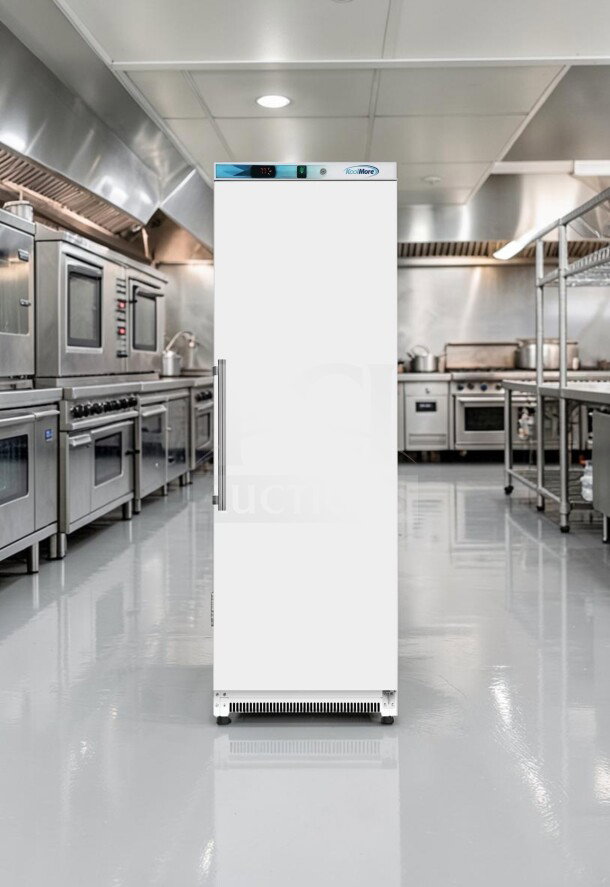 Elite KoolMore KM-FMD12WH Reach-In Freezer, 12 Cu. Ft., manual defrost, white, fully tested, excellent condition, in commercial kitchen.