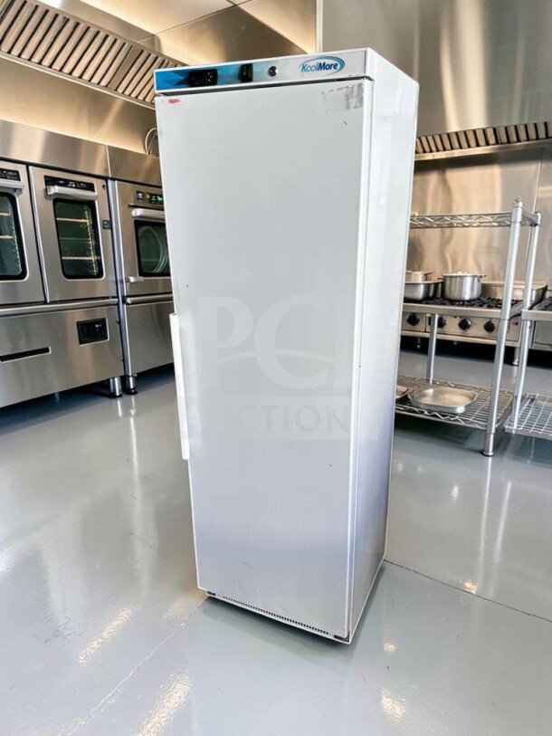 KoolMore KM-FMD12WH commercial reach-in freezer, 12 Cu. Ft., white, manual defrost, elite condition, fully tested and operational.