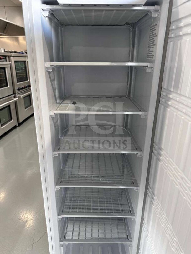 KoolMore KM-FMD12WH commercial reach-in freezer, 12 Cu. Ft., manual defrost, white, elite condition, multiple shelves.