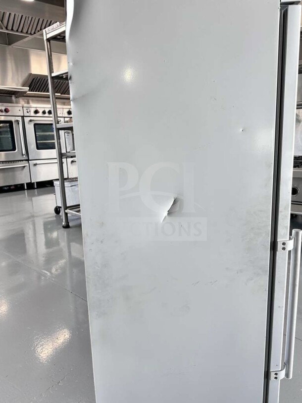 KoolMore KM-FMD12WH reach-in freezer, 12 Cu. Ft., white, manual defrost, dent on side, fully tested and operational.