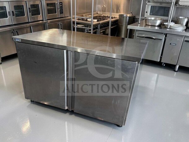 GSW CTD-P3048H 48" stainless steel work table with hinged doors and mid-shelf, excellent condition, fully operational.