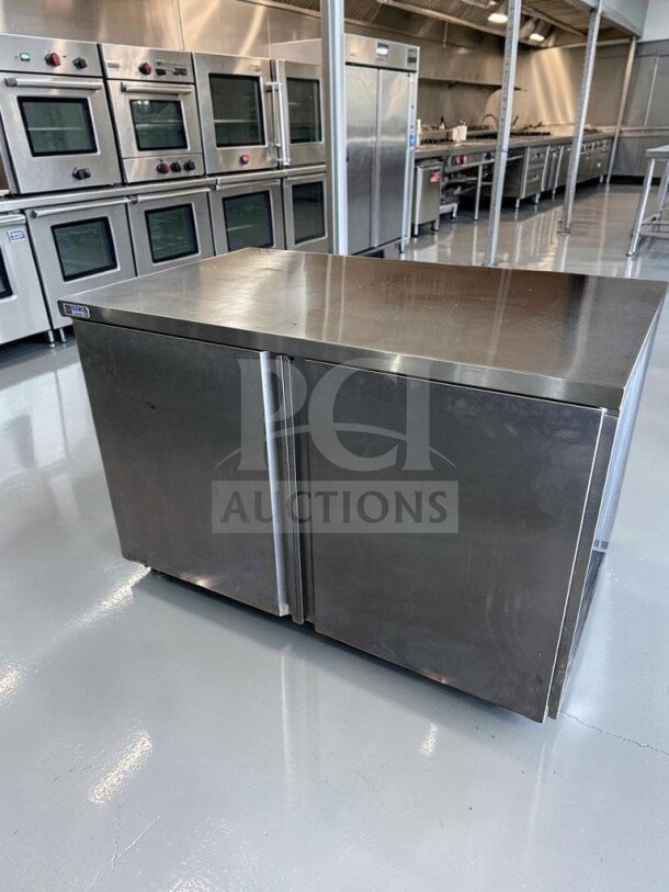 GSW CTD-P3048H 48" stainless steel work table with hinged doors, mid-shelf, excellent condition, fully operational.