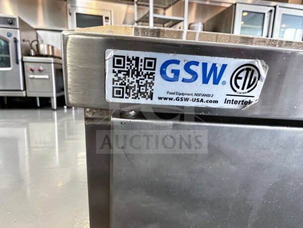 GSW CTD-P3048H 48” stainless steel commercial work table with hinged doors, mid-shelf, GSW-USA label, in excellent condition.