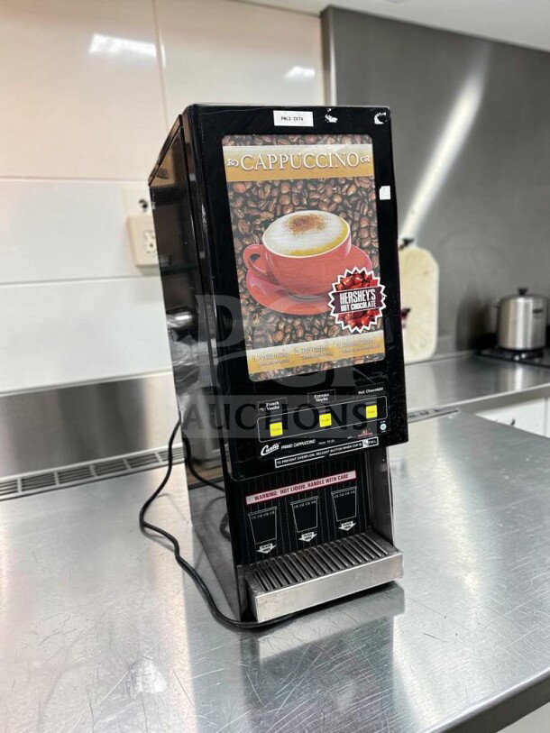 Wilbur Curtis PC-3D-10-01 cappuccino machine, 3 hoppers, excellent condition, tested operational, 120V, countertop display.