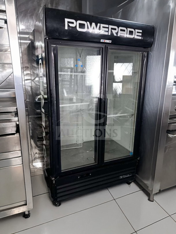 True GDM-43EM two-door commercial refrigerator, exceptional condition, glass doors, Powerade branding, 115V, fully operational.