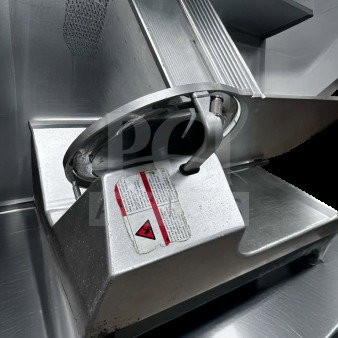 Bizerba GSP HD commercial automatic meat slicer in pristine condition, missing blade cover, 120V, fully operational.