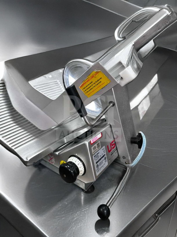 Bizerba GSP HD commercial meat slicer in pristine condition, 120V, missing blade cover, fully operational, with visible labels.
