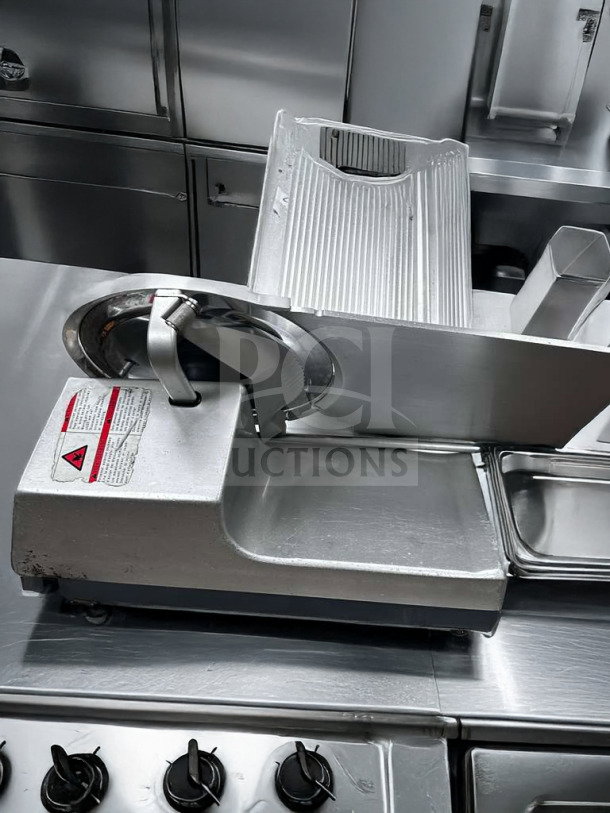 Bizerba GSP HD commercial meat slicer in pristine condition, heavy-duty, 120V, missing blade cover, fully tested, operational.