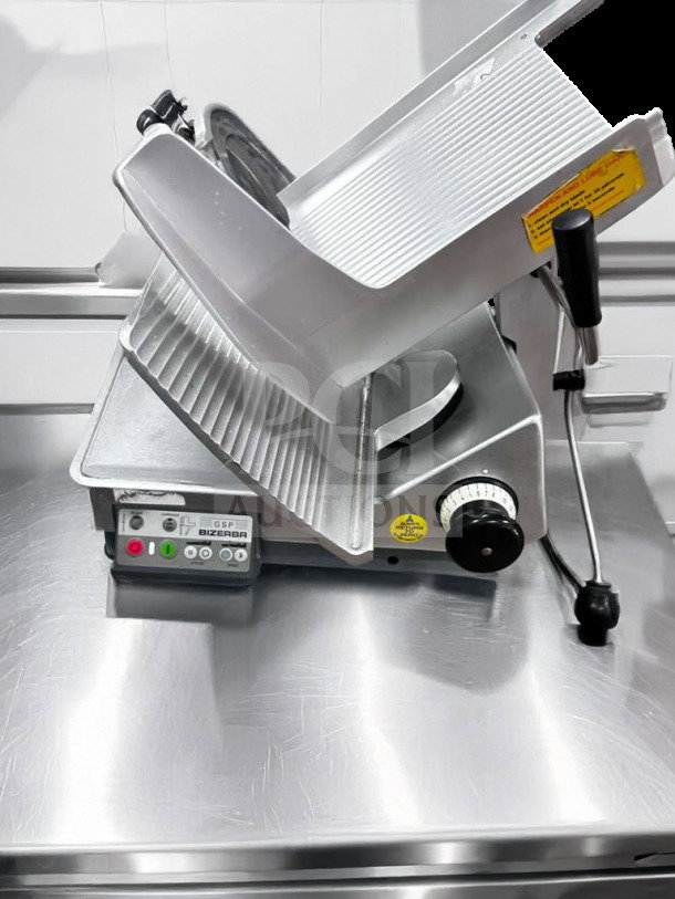 Bizerba GSP HD automatic meat slicer in pristine condition, missing blade cover. Heavy-duty, 120V, fully tested and operational.