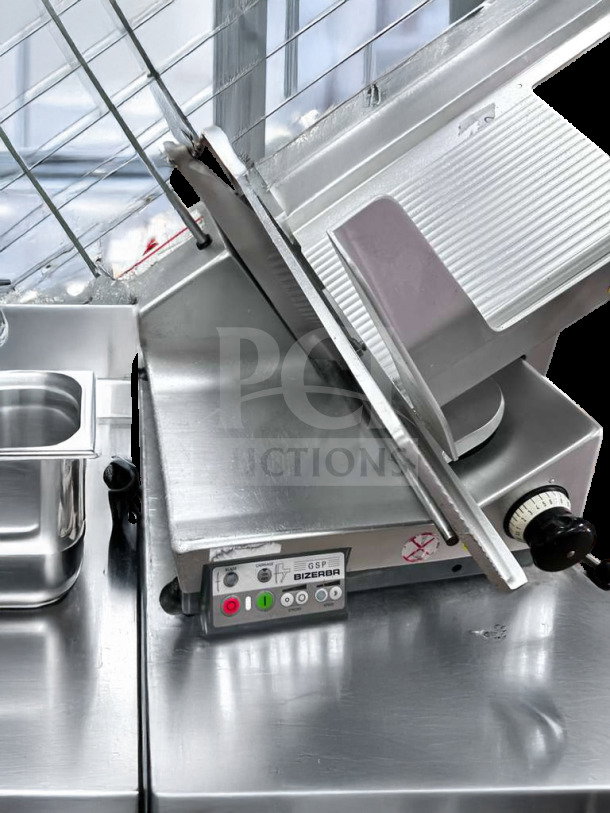 Bizerba GSP HD commercial meat slicer in pristine condition, missing blade cover, 120V, fully operational, control panel shown.