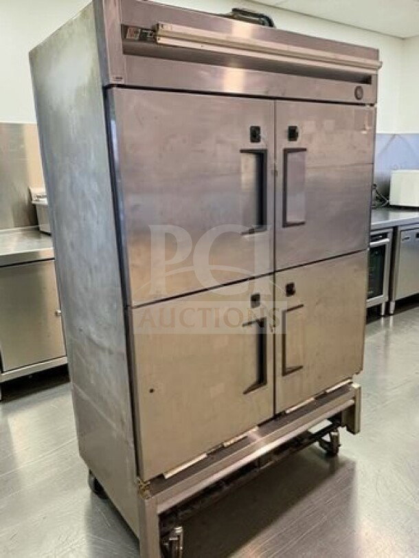 Stainless steel True T-49-4 commercial 4-door reach-in refrigerator in exceptional condition, fully tested and operational.