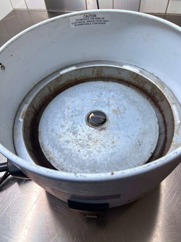 Thunder Group SEJ-50000 commercial rice cooker, large capacity, 120V. Outstanding condition, NSF & UL listed. Caution label visible.