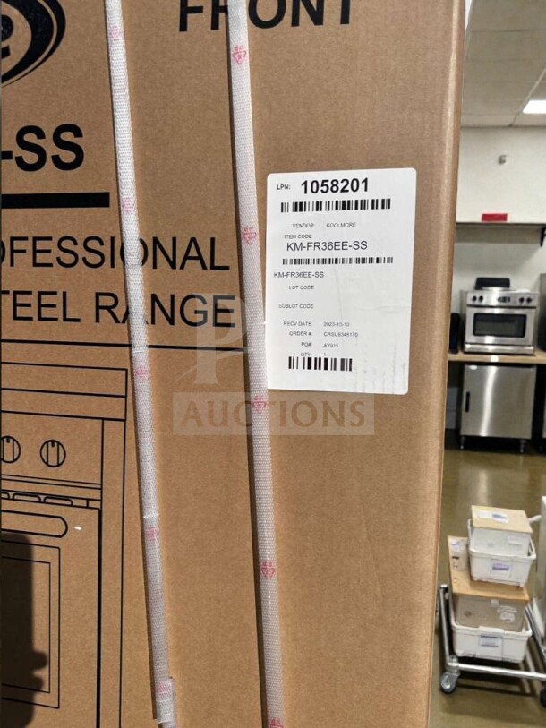 KoolMore 36" Professional Electric Range, model KM-FR36EE-SS, new with scratch & dent. Box displays labels and shipping info.