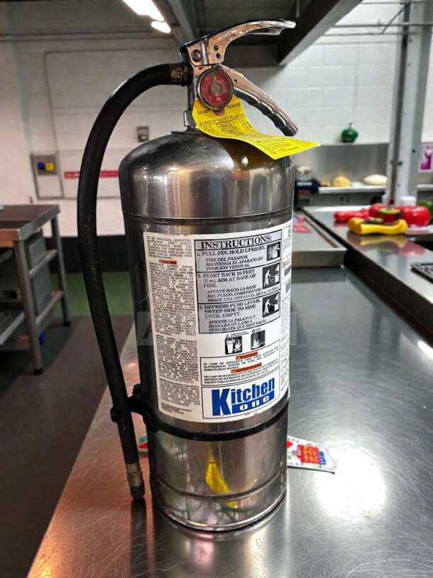 Pyro-Chem KS-6100 Class K fire extinguisher, elite condition, UL Listed, inspected, operational, Kitchen One branding visible.