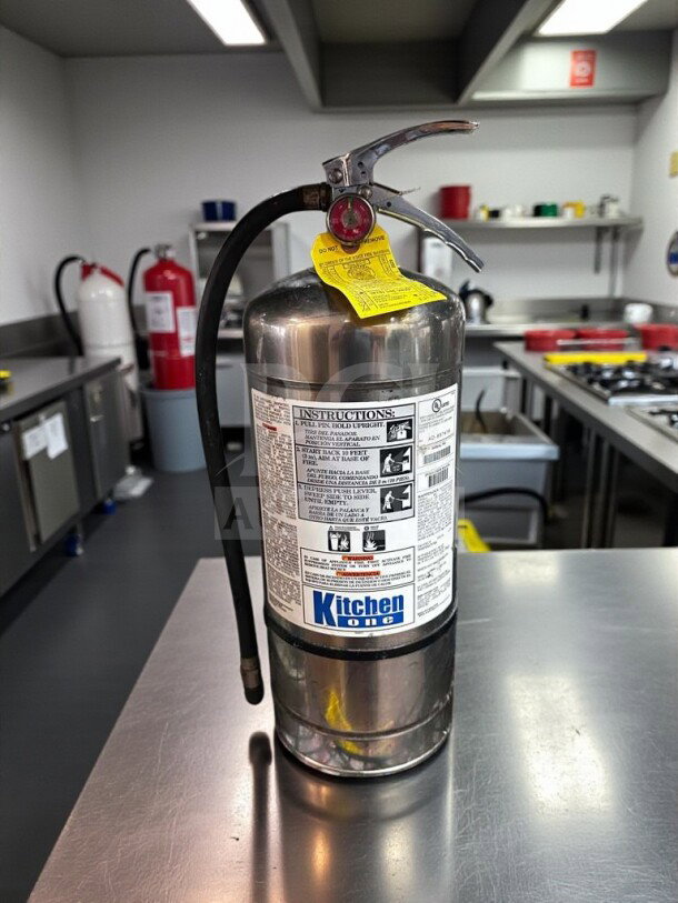 Pyro-Chem KS-6100 Class K fire extinguisher, UL listed, inspected, stainless steel, Kitchen One label, elite condition.