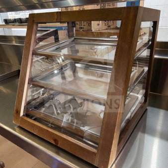 Remarkable condition 2-tier wooden countertop pastry display case with glass panels. Fully tested and operational. Model WDC-S-DSP-0988.