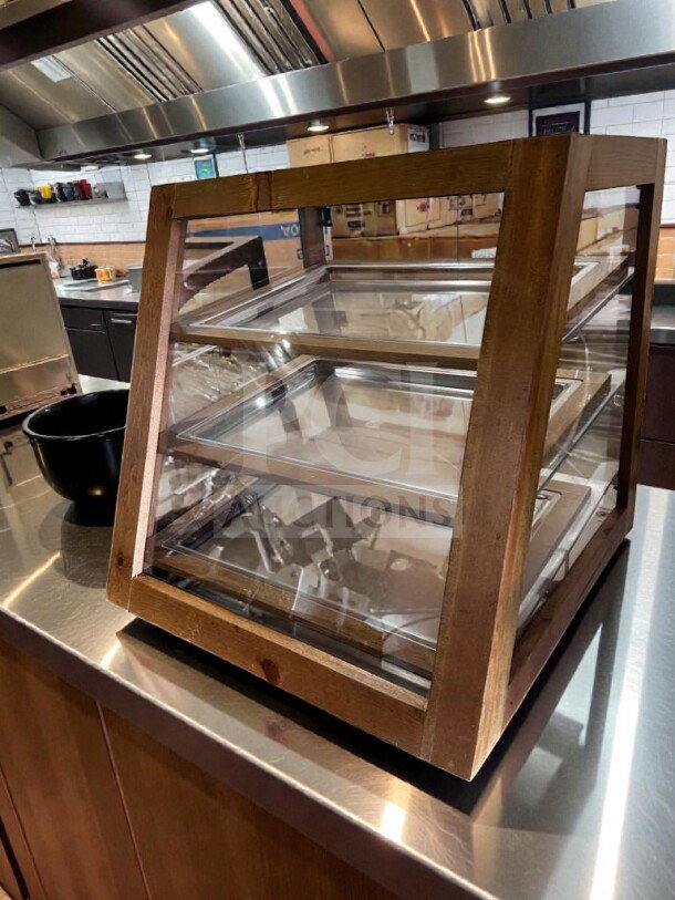 2-tier wooden countertop pastry display case with glass sides, model WDC-S-DSP-0988. Remarkable condition, fully operational.