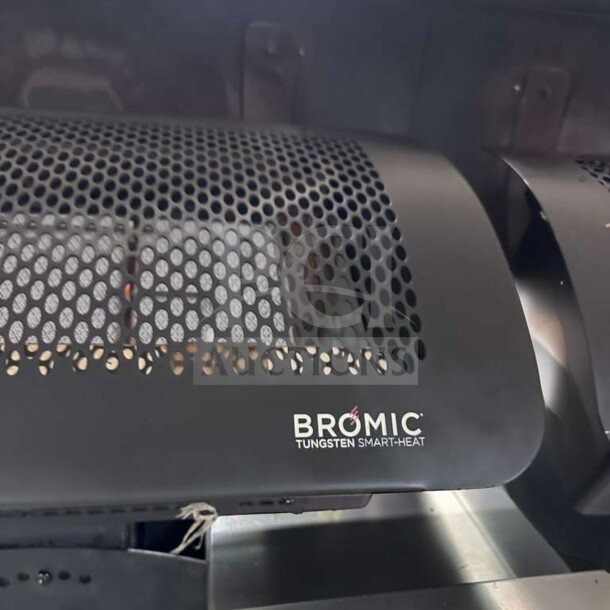 Bromic Tungsten Smart-Heat gas radiant heater, wall-mounted with a perforated cover. Elite condition, fully tested.