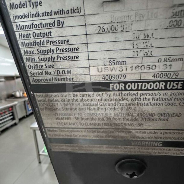 Label on Bromic Tungsten Smart-Heat Gas Radiant Heater detailing heat output, pressure, and installation requirements.