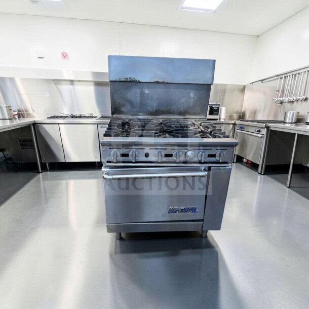 Exceptional condition Imperial IR-6 36" commercial gas range with 6 burners and oven, natural gas, heavy duty, fully tested.