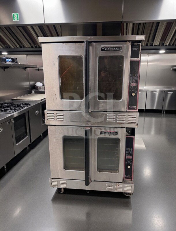 Alt text: Garland Master 450 Gas Convection Ovens, full-size, stainless steel, model GAR-L-OVEN-1090, excellent condition, fully tested.