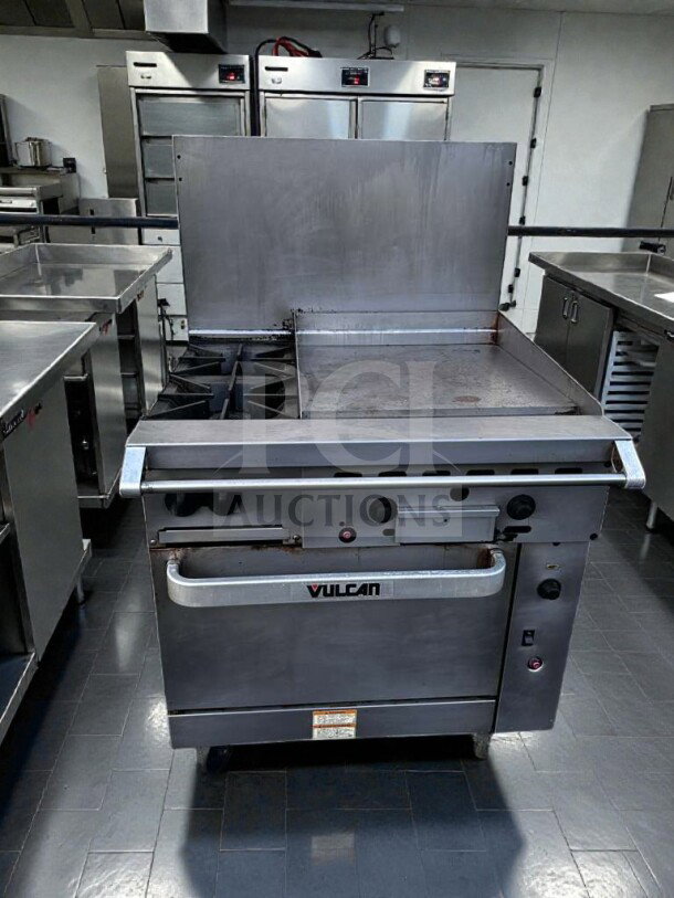 Vulcan 36C-2B24GTN natural gas range with 2 burners, 24" griddle, convection oven, NSF/CSA listed, fully operational.